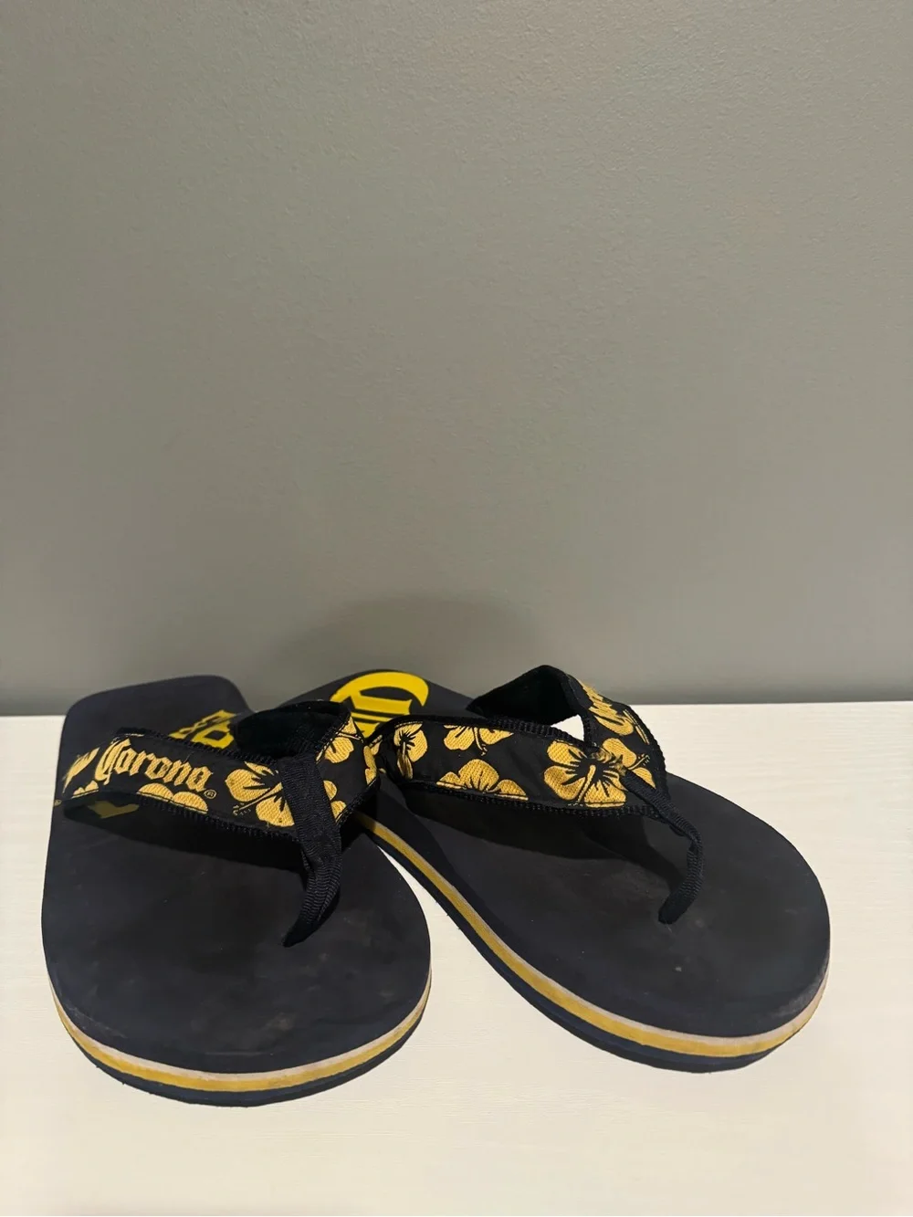 Corona Black and Yellow Hibiscus Flip Flops see photos for measurement
